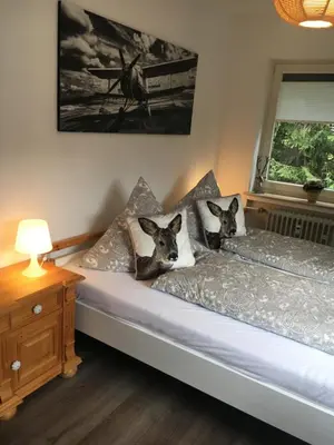 Ein Bett oder Betten in einem Zimmer der Unterkunft Ferienwohnung Fuchsbau