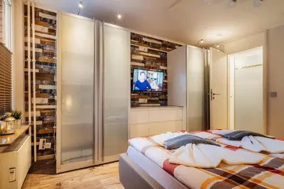 Ein Bett oder Betten in einem Zimmer der Unterkunft Wurmberg Baude 2