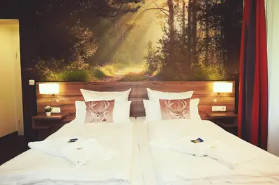 Ein Bett oder Betten in einem Zimmer der Unterkunft Hotel Mein Bergblick