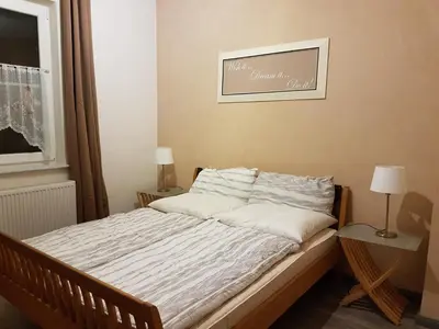 Ein Bett oder Betten in einem Zimmer der Unterkunft Ferienwohnungen Harz - Wieda