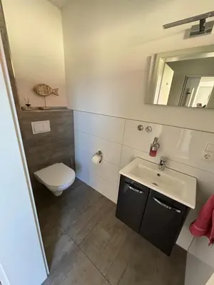 Ein Badezimmer in der Unterkunft Ferienhaus Glücksmoment