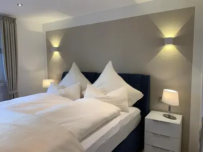 Ein Bett oder Betten in einem Zimmer der Unterkunft Harzfewo Köhnke 7