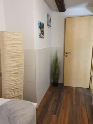 Ein Bett oder Betten in einem Zimmer der Unterkunft Eddy's Stadt Appartement