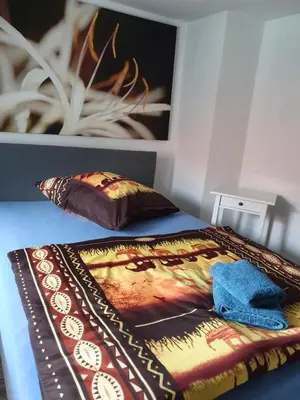 Ein Bett oder Betten in einem Zimmer der Unterkunft Eddy's Stadt Appartement