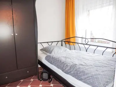 Ein Bett oder Betten in einem Zimmer der Unterkunft Stilvolles Ferienhaus Artdeco