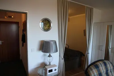 Ein Sitzbereich in der Unterkunft Apartment am Kurpark