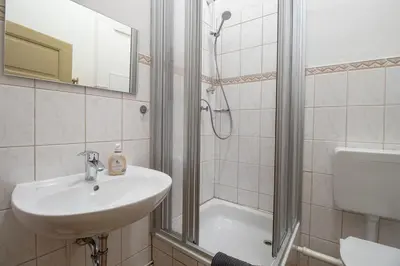Ein Badezimmer in der Unterkunft Ferienwohnung mit Brunnen