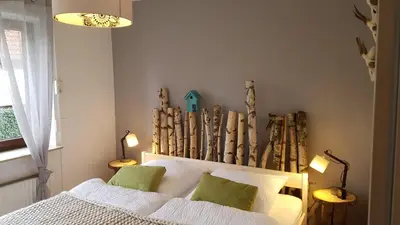 Ein Bett oder Betten in einem Zimmer der Unterkunft Ferienwohnung Am Casinopark