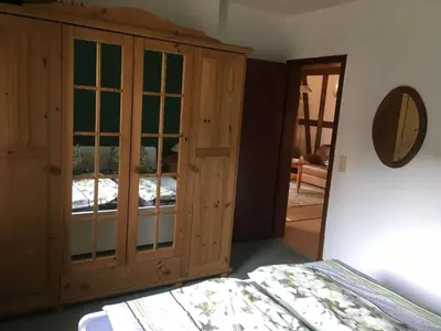 Ein Bett oder Betten in einem Zimmer der Unterkunft Ferienwohnung in Kamschlacken