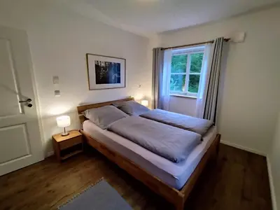 Ein Bett oder Betten in einem Zimmer der Unterkunft Ferienhaus Chalet Goldberg