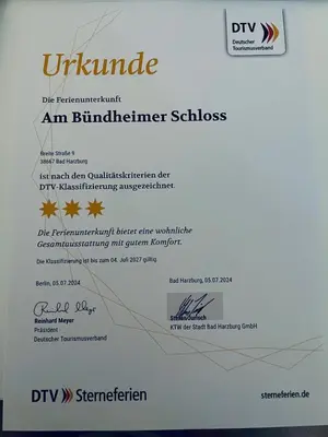 Ein Zertifikat, Auszeichnung, Logo oder anderes Dokument, das in der Unterkunft Ferienwohnung Am Bündheimer Schloss ausgestellt ist