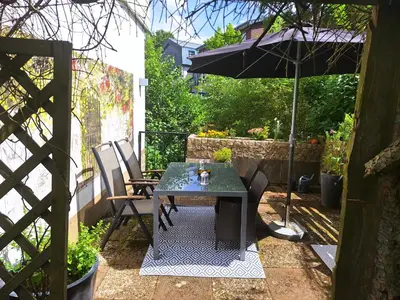 Ein Garten an der Unterkunft Chalet an der Bode - 2 Zi Fewo zentral am Marktplatz