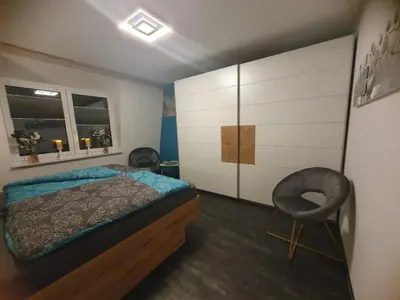 Ein Bett oder Betten in einem Zimmer der Unterkunft Ferienwohnung ODIN, FREYA & THOR