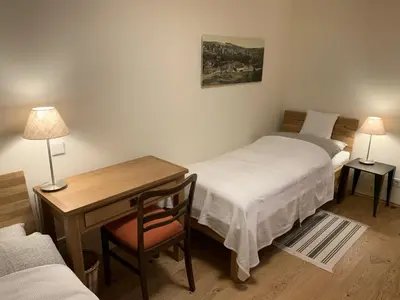 Ein Bett oder Betten in einem Zimmer der Unterkunft Bergmannstrost 5 Sterne Ferienwohnung