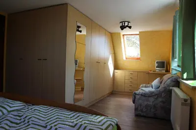 Ein Bett oder Betten in einem Zimmer der Unterkunft Ferienwohnung Halberstadt