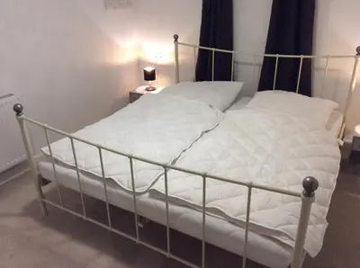 Ein Bett oder Betten in einem Zimmer der Unterkunft Ferienwohnung Harzblick 1