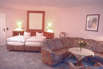 Ein Bett oder Betten in einem Zimmer der Unterkunft Hotel Sonnenhof