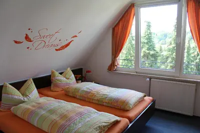 Ein Bett oder Betten in einem Zimmer der Unterkunft Haus Hanseatic Ferienwohnungen