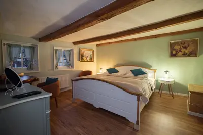 Ein Bett oder Betten in einem Zimmer der Unterkunft Gesindehaus Bornecke