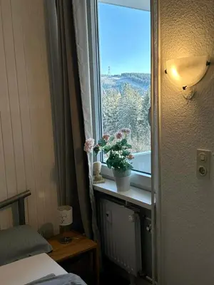 Ein Bett oder Betten in einem Zimmer der Unterkunft App 507 Bocksbergblick im Ferienpark Hahnenklee Haus 1