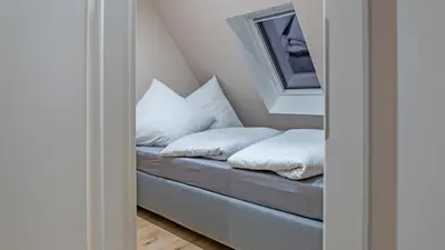 Ein Bett oder Betten in einem Zimmer der Unterkunft Ferienwohnungen Harzblick