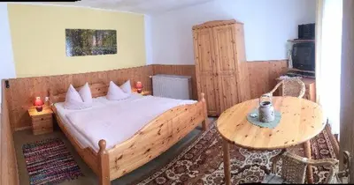 Ein Bett oder Betten in einem Zimmer der Unterkunft Ferienwohnungen Weber