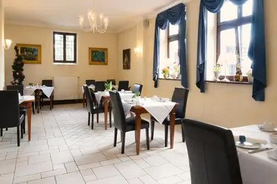 Ein Sitzbereich in der Unterkunft Schlosshotel zum Markgrafen