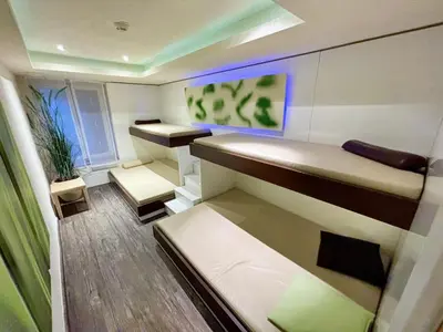 Ein Bett oder Betten in einem Zimmer der Unterkunft REGIOHOTEL Berghotel Ilsenburg - #Panoramablick #Wellness #Wallbox #GroßesAbendbuffet