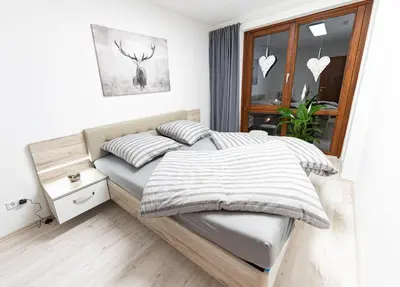 Ein Bett oder Betten in einem Zimmer der Unterkunft Apartment Mittendrin in Bad Harzburg