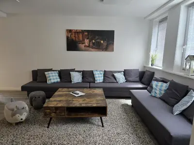 Ein Sitzbereich in der Unterkunft Großes schönes Ferienhaus mit Garten für 12 Personen erwartet Sie im Harz!