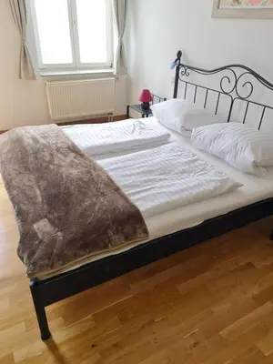 Ein Bett oder Betten in einem Zimmer der Unterkunft Ferienwohnung an der Salamanderburg