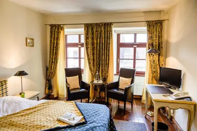 Ein Bett oder Betten in einem Zimmer der Unterkunft Hotel Zum Bär