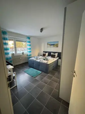 Ein Bett oder Betten in einem Zimmer der Unterkunft International 4