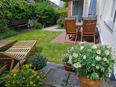 Ein Garten an der Unterkunft Harznester - Ferienhaus am Horstberg