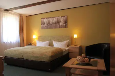 Ein Bett oder Betten in einem Zimmer der Unterkunft Altes Forsthaus Braunlage