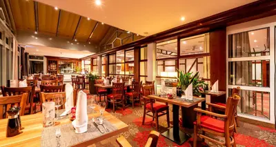 Ein Restaurant oder anderes Speiselokal in der Unterkunft PLAZA INN Goslar