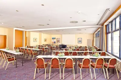 Ein Restaurant oder anderes Speiselokal in der Unterkunft HKK Hotel Wernigerode