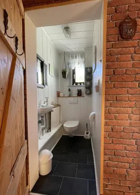 Ein Badezimmer in der Unterkunft datHuus
