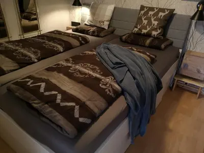 Ein Bett oder Betten in einem Zimmer der Unterkunft Ferienwohnung - Fiete - in Altenau im Harz bis 4 Pers Hunde willkommen