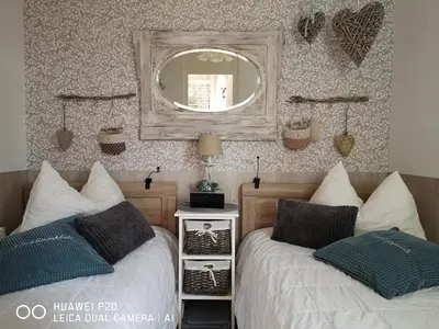 Ein Bett oder Betten in einem Zimmer der Unterkunft Ferienwohnung - Fiete - in Altenau im Harz bis 4 Pers Hunde willkommen