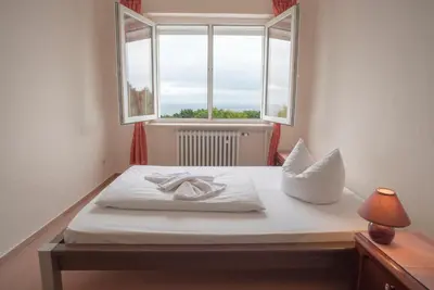 Ein Bett oder Betten in einem Zimmer der Unterkunft Berggasthof Ziegenkopf