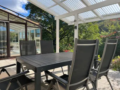 Ein Patio oder anderer Außenbereich in der Unterkunft Waldhaus Harz, Natur pur mit Pool, Sauna und traumhaften Garten