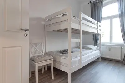 Ein Bett oder Betten in einem Zimmer der Unterkunft Ferienwohnungen Quedlinburg im Harz