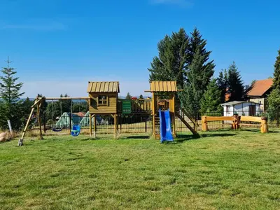 Ein Kinderspielbereich in der Unterkunft Harz Pension