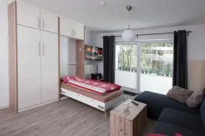 Ein Bett oder Betten in einem Zimmer der Unterkunft Apartment an der Wurmbergseilbahn 1