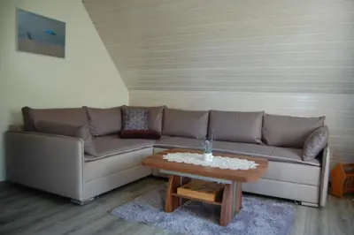 Ein Sitzbereich in der Unterkunft Ferienwohnung Hertha