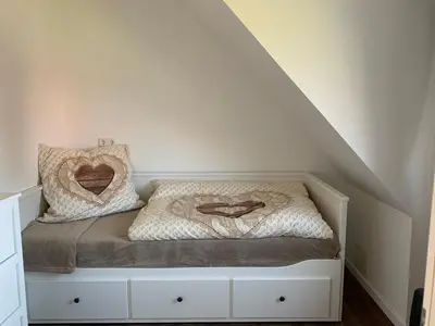 Ein Bett oder Betten in einem Zimmer der Unterkunft Harzstübl25