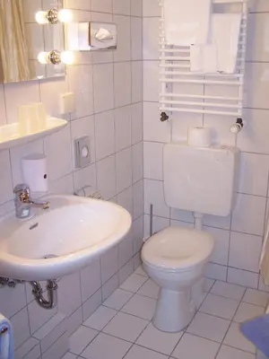 Ein Badezimmer in der Unterkunft Mein Vierjahreszeiten Hotel Garni Superior