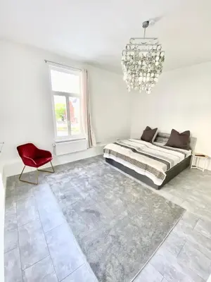 Ein Sitzbereich in der Unterkunft Ferienwohnungen Rosentor Goslar Zentrum 180qm & 300qm