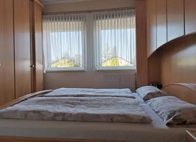 Ein Bett oder Betten in einem Zimmer der Unterkunft Fewo am Sassenberg